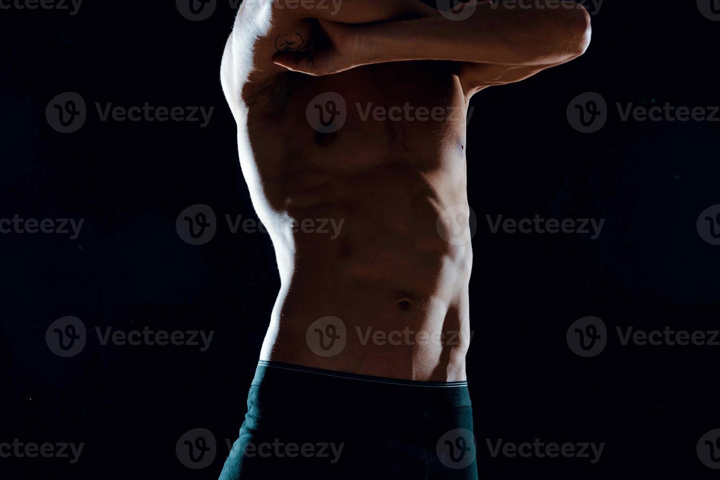 Atlético homem muscular abdômen cortada Visão motivação exercício ginástica foto
