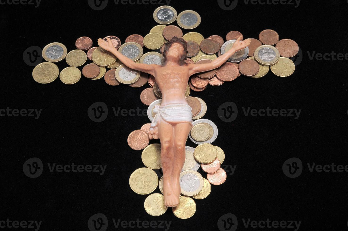 Jesus em uma moeda Cruz foto