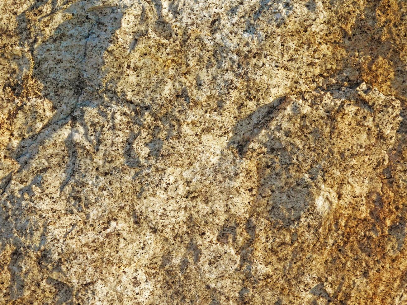 close-up de pedra ou parede de rocha para plano de fundo ou textura foto