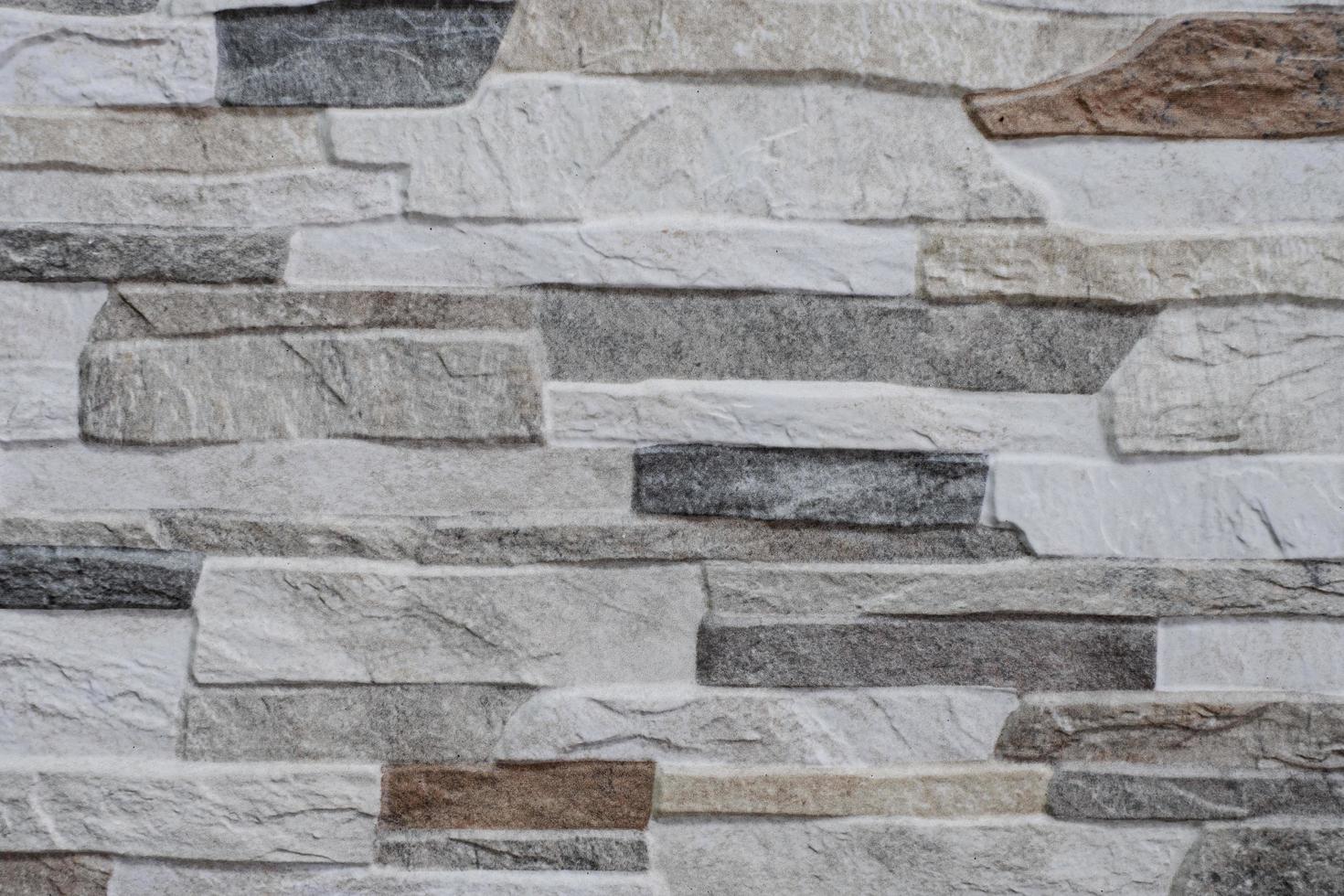 textura de fundo de quartzito de decoração de pedra natural de fachada. parede de granito moderna foto