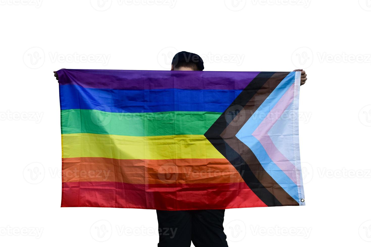 lgbt bandeira segurando dentro mãos com recorte caminhos, conceito para lgbt celebrações dentro orgulho mês, junho, por aí a mundo. foto