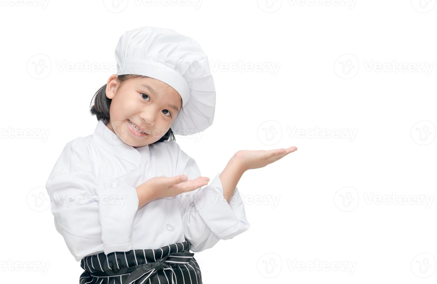 criança chefe de cozinha mostrando e apresentando foto