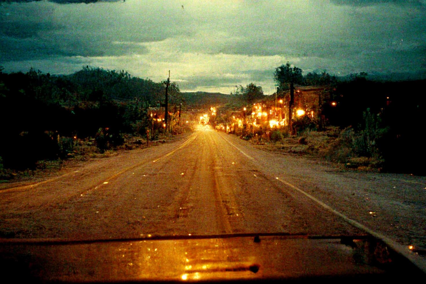 Visão do uma rua às noite a partir de a parabrisa do uma carro. generativo ai. foto