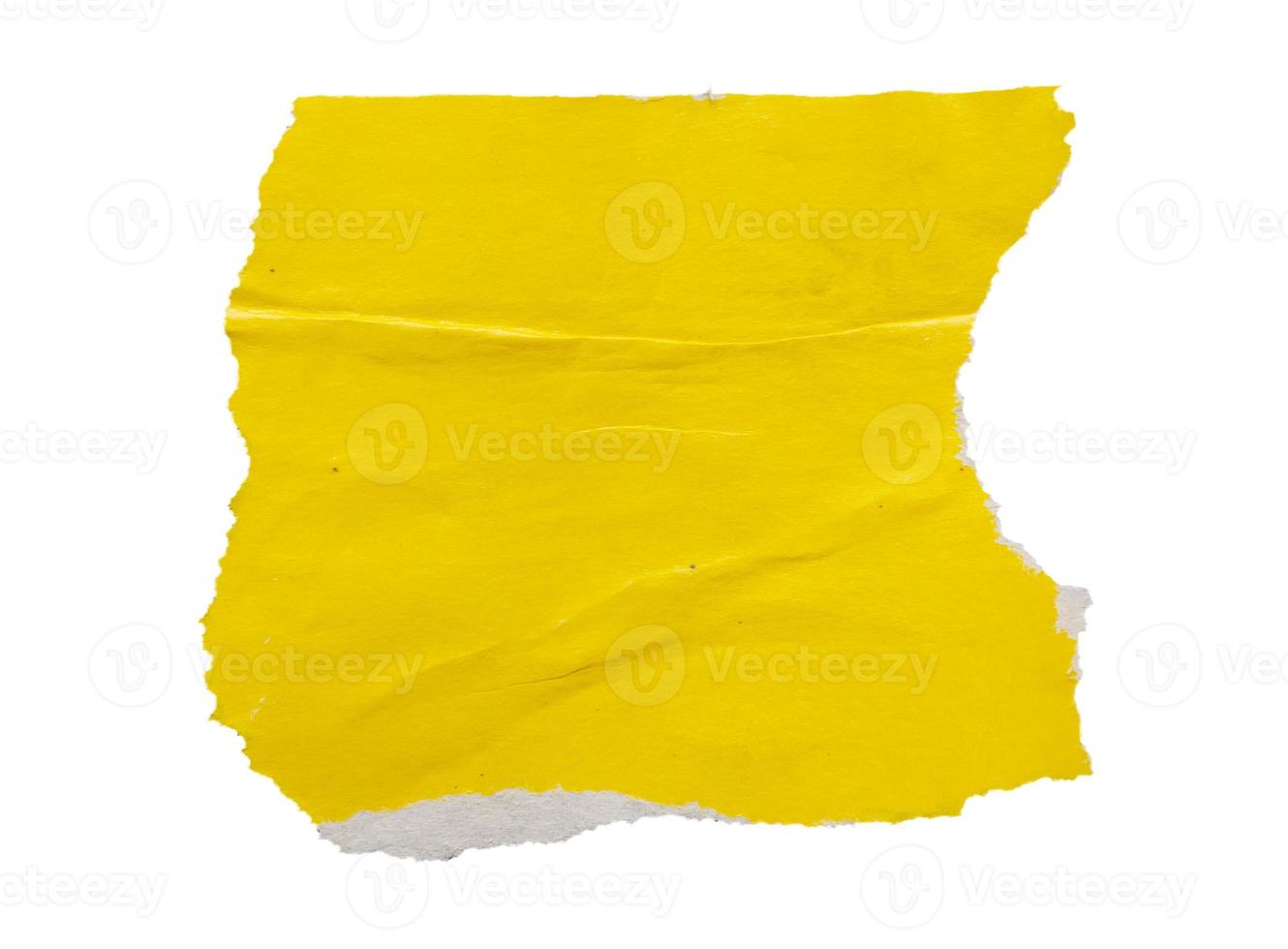 peça do amarelo papel lágrima isolado em branco fundo foto