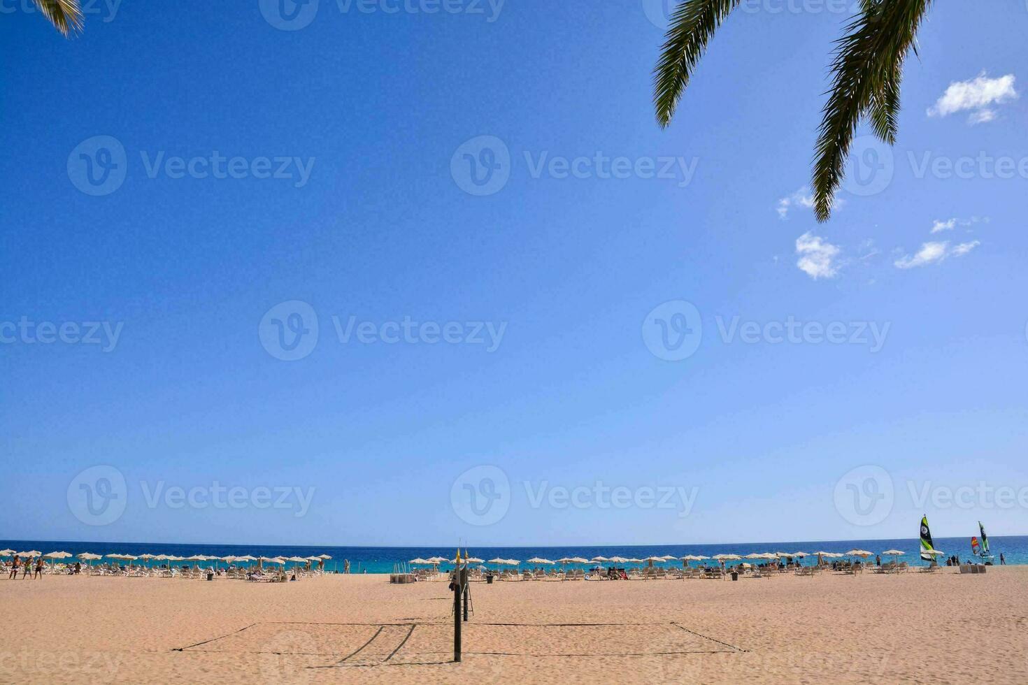 na praia foto