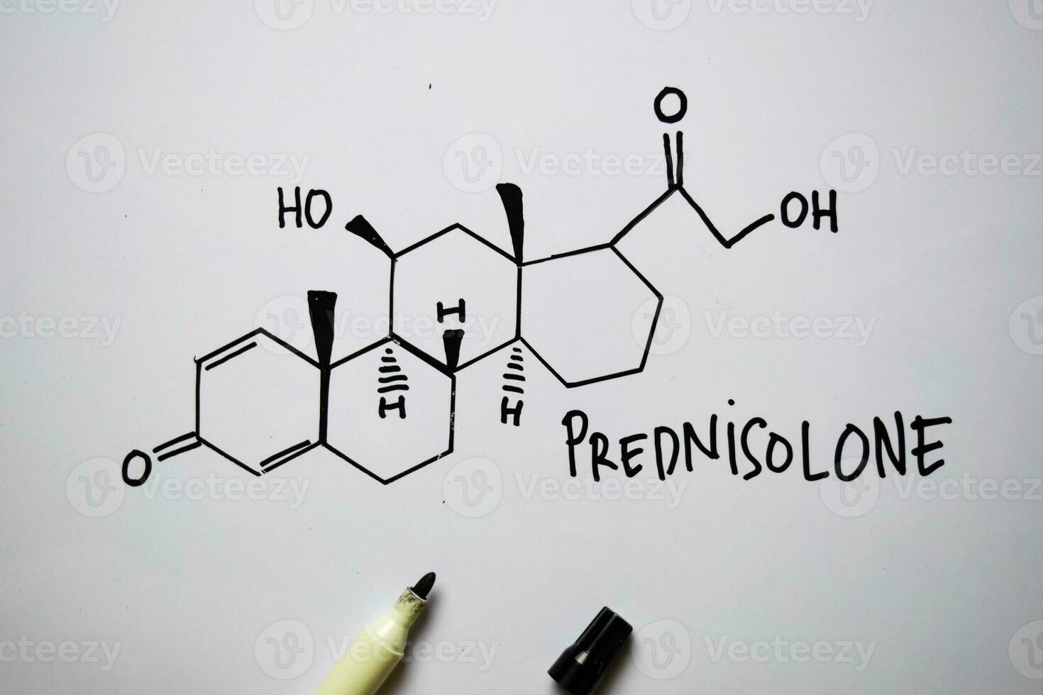 prednisolona molécula escrito em a branco borda. estrutural químico Fórmula. Educação conceito foto