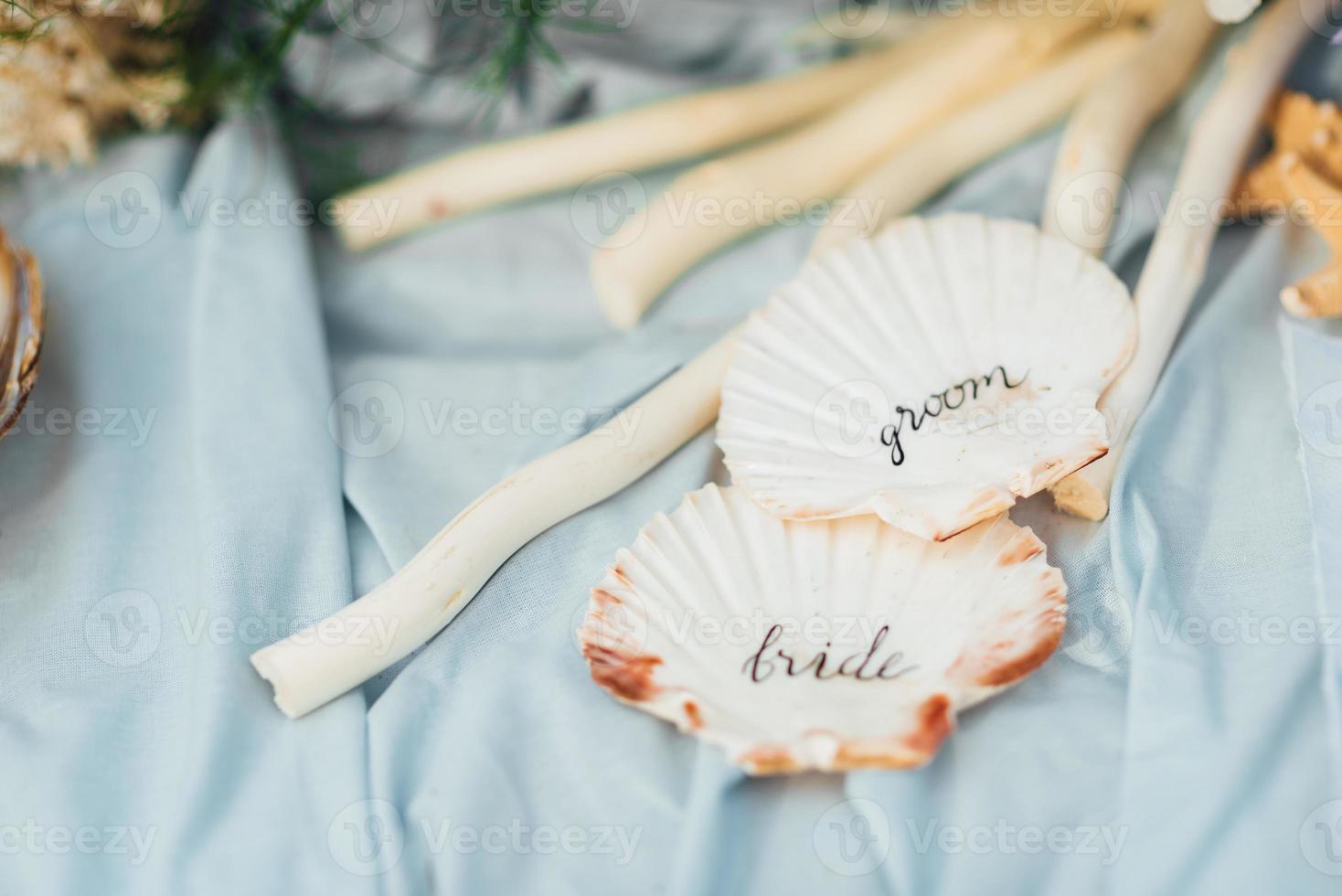 decoração de casamento com estrelas do mar e conchas do mar foto