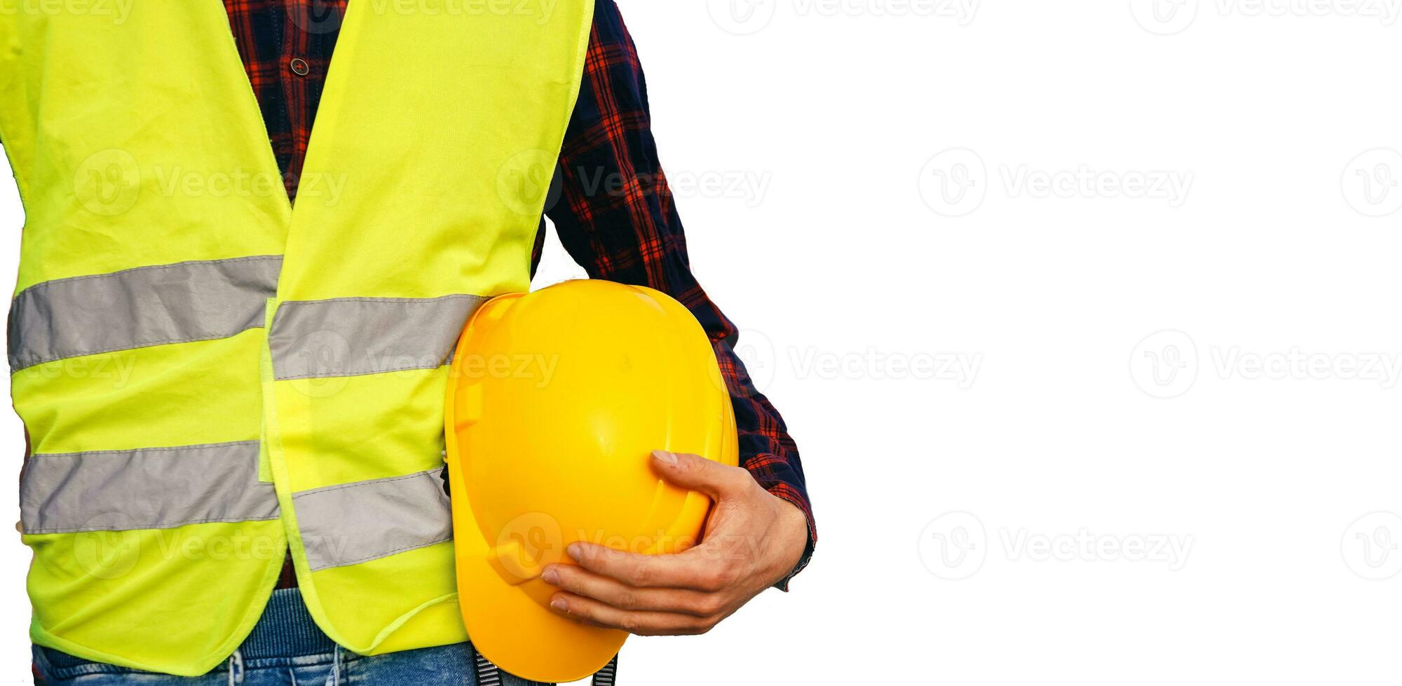 construção trabalhador segurando amarelo capacete. construção trabalhador vestindo fluorescente colete. isolado. foto