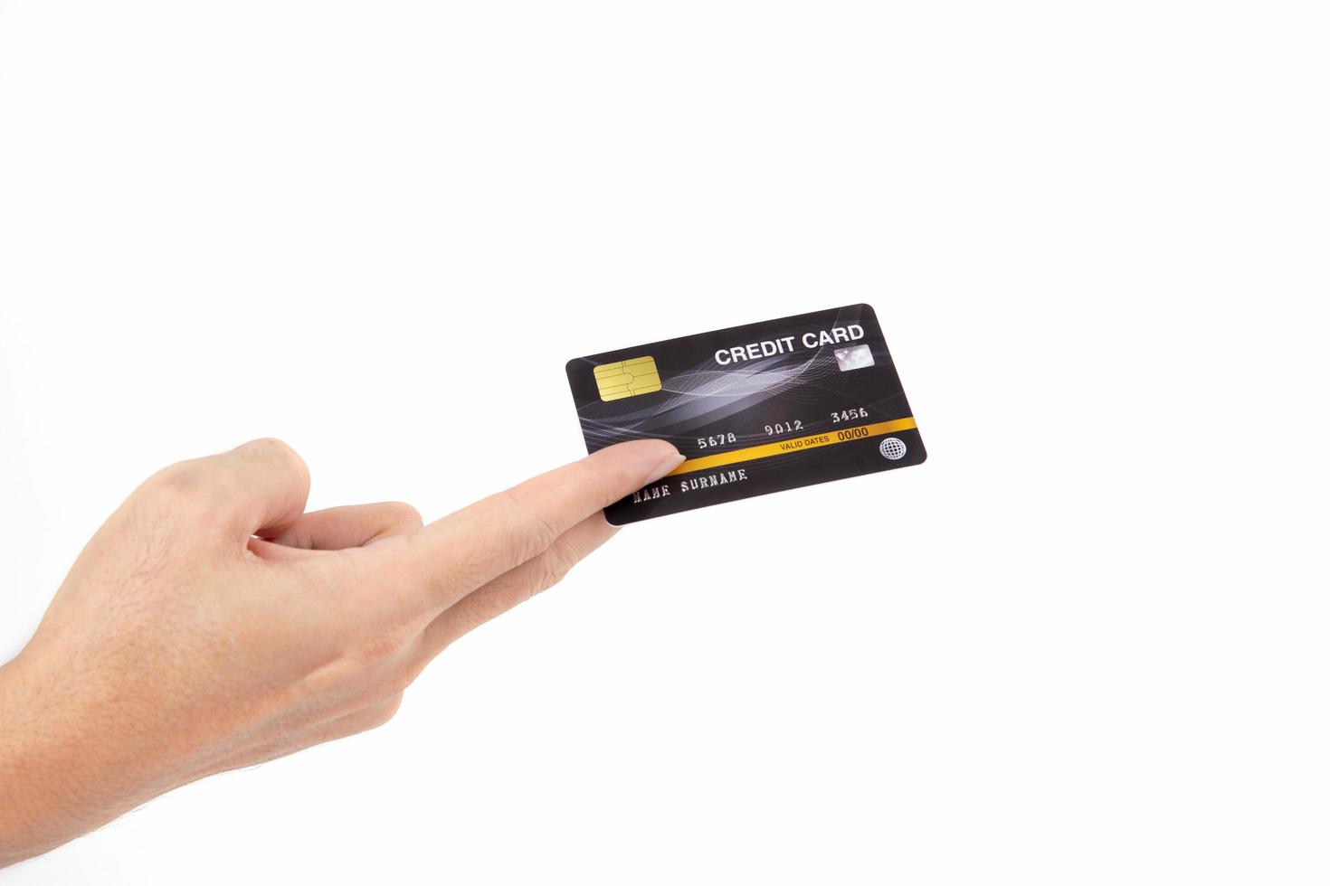 mão segurando o cartão de crédito isolado no branco conceito de pagamento online de compras de negócios foto