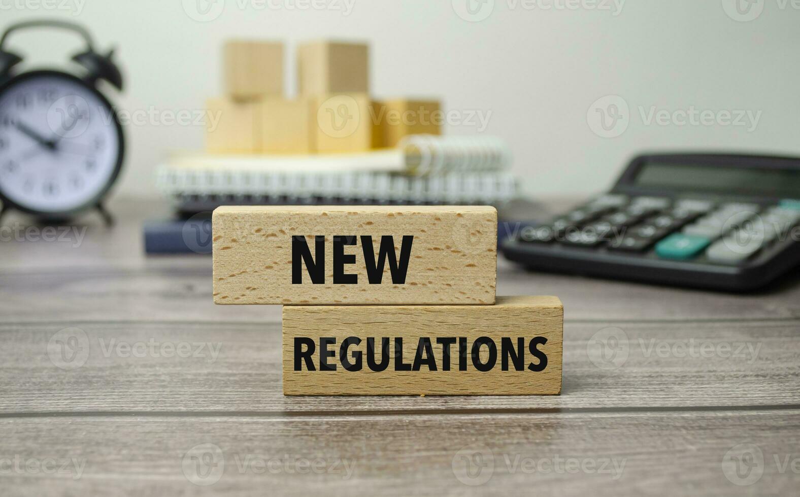 Novo regulamentos é mostrando em uma conceptual foto usando de madeira blocos