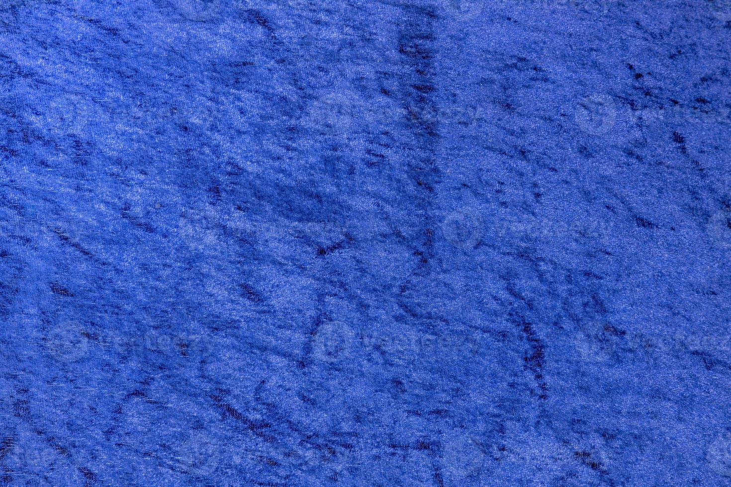 tecido de veludo azul claro brilhante uniforme como fundo foto