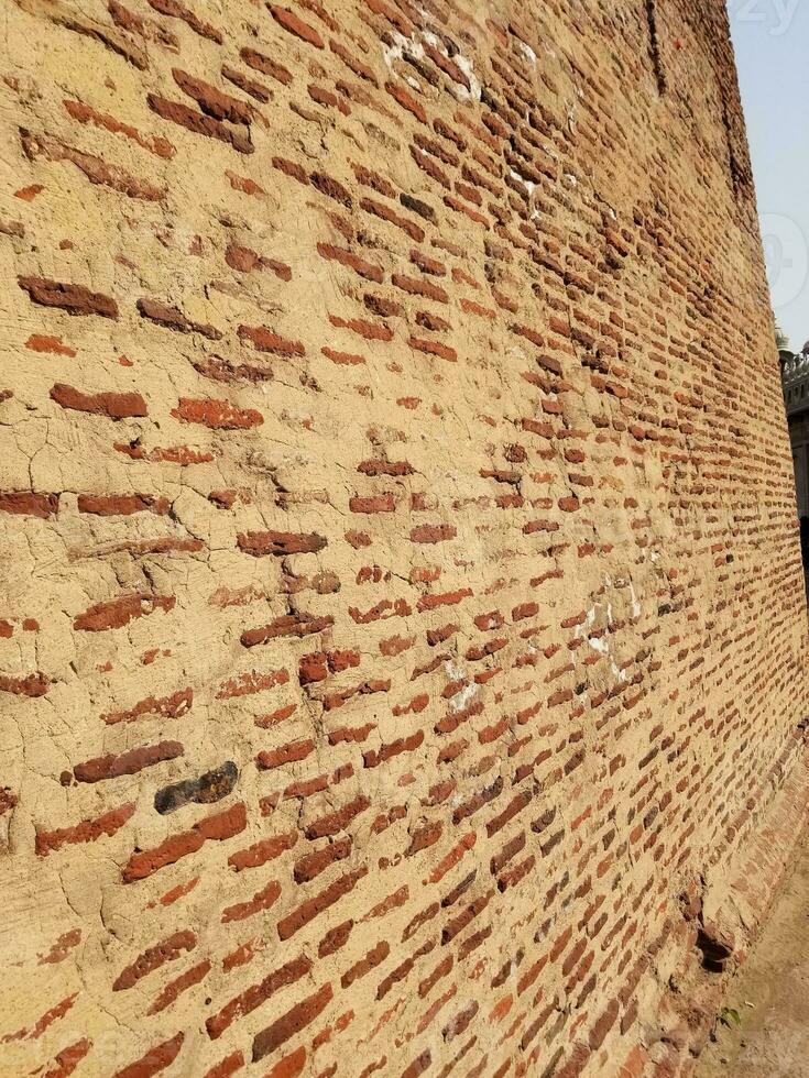 a exterior parede do a Badshahi forte foto
