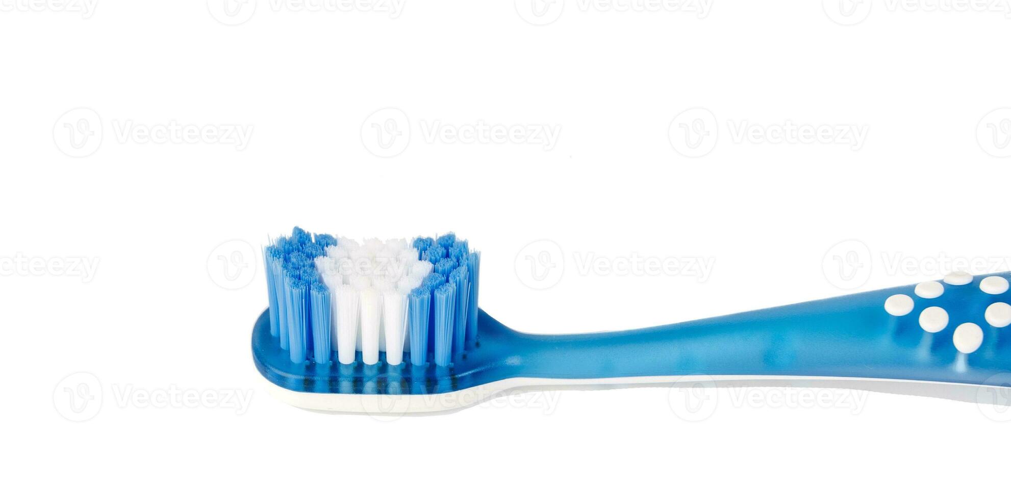 uma bebê azul escova de dente é isolado em uma branco fundo foto