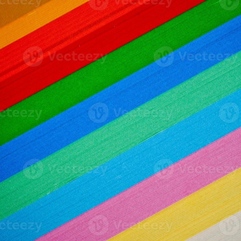 papéis multicoloridos com fundo texturizado foto