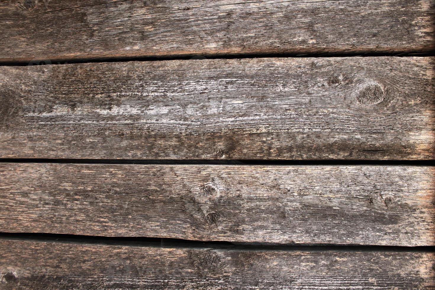 fundo de superfície de mesa de madeira escura com textura de madeira e espaços entre as tábuas foto