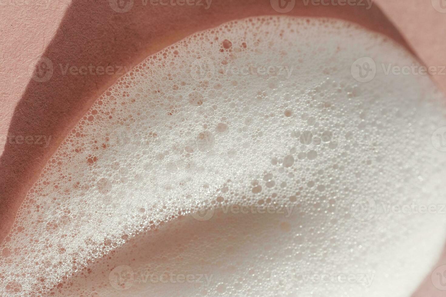 textura do branco espuma em uma Rosa fundo. foto