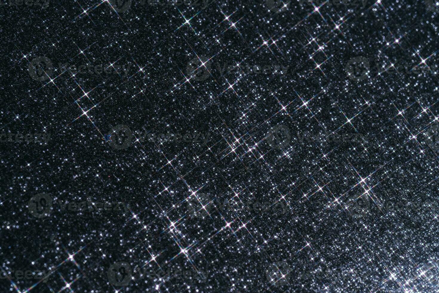 abstrato profundo azul fundo com brilhos dentro a forma do estrelas. foto