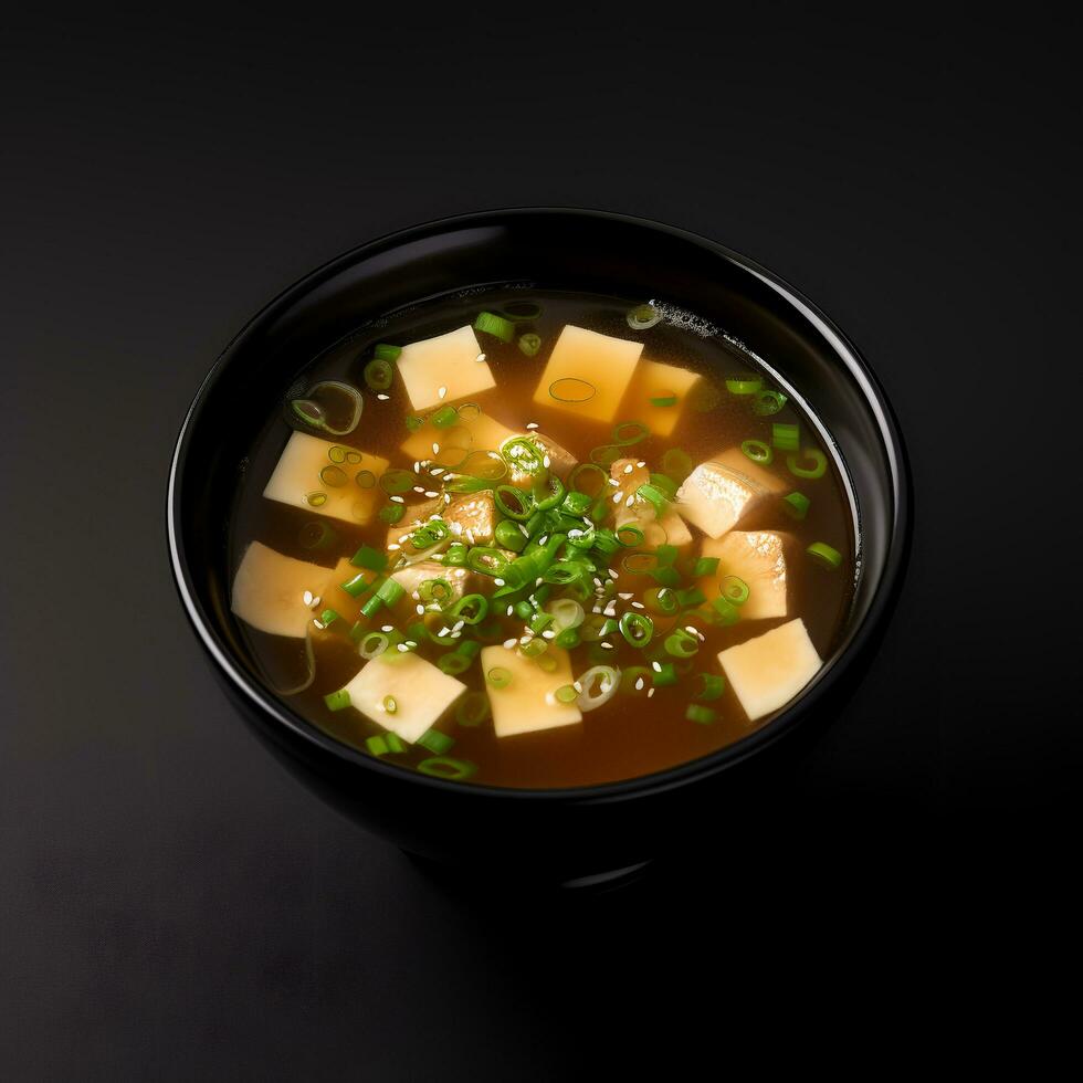 Comida fotografia do missô sopa em Preto tigela isolado em Sombrio fundo. generativo ai foto