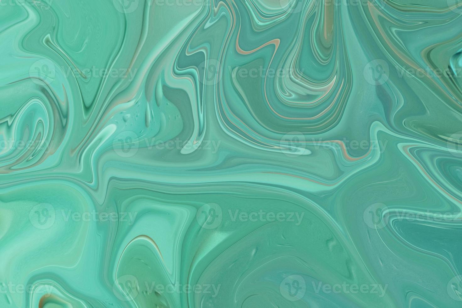 foto macro de gotas de óleo na água em um fundo verde azul desfocado