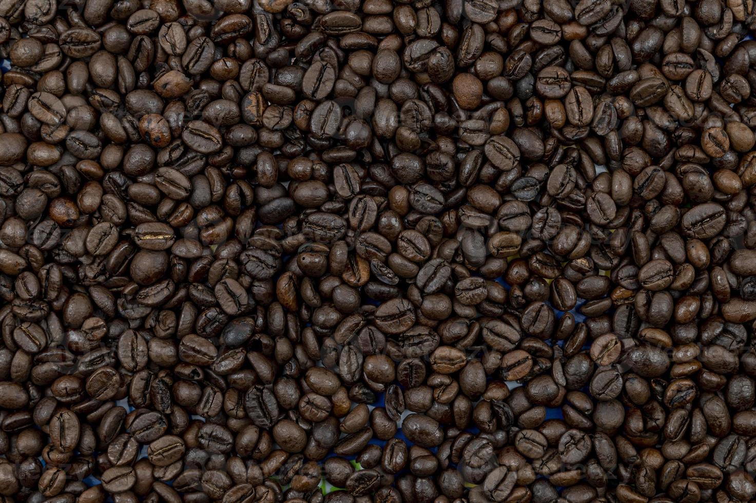 textura de grãos de café torrados foto