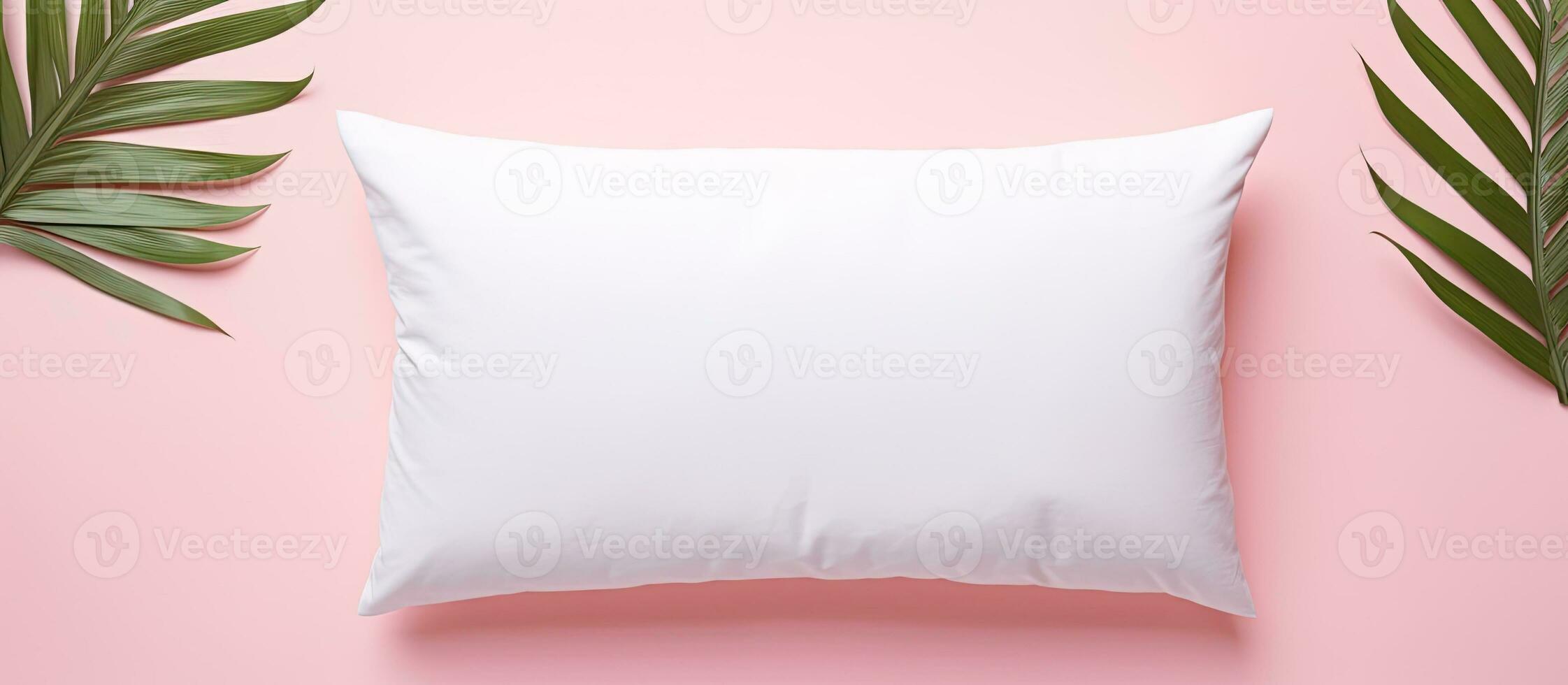 foto do uma branco travesseiro Próximo para uma vibrante Rosa plantar em uma minimalista fundo com cópia de espaço