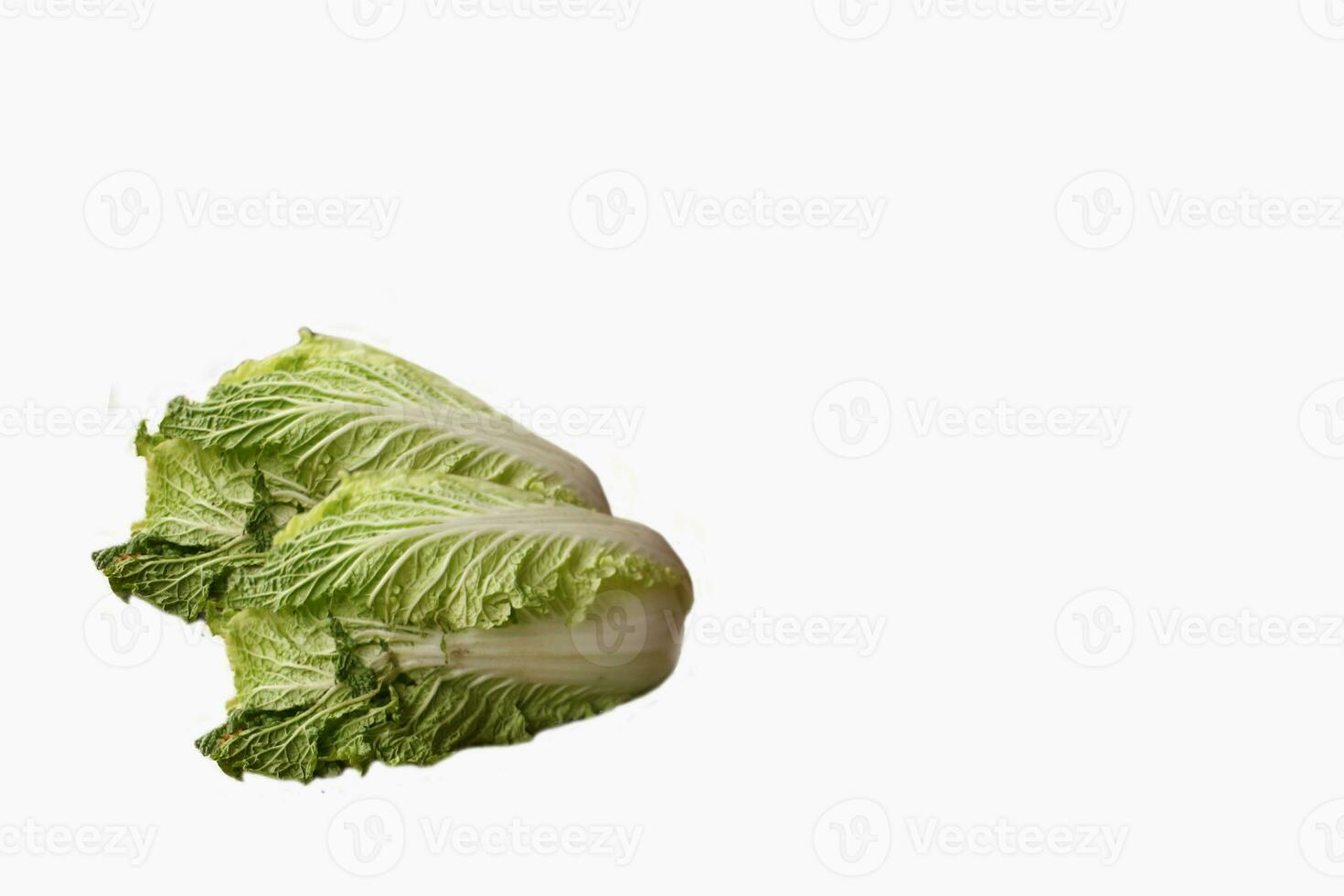 mostarda verduras em uma avião branco fundo foto