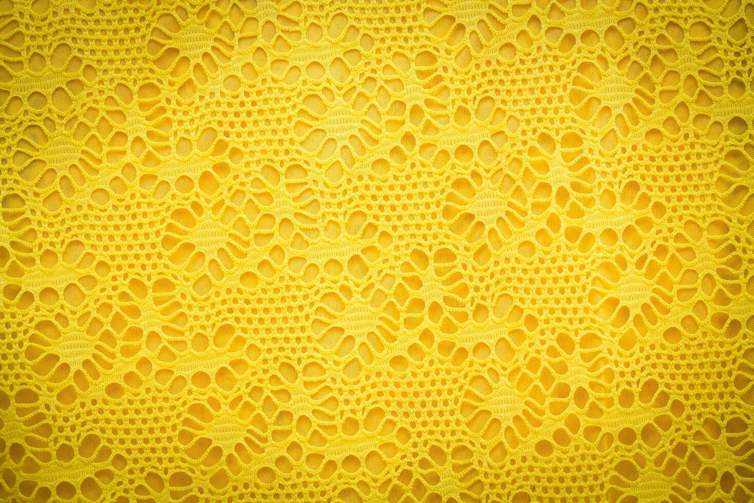 amarelo renda tecido fundo textura. foto