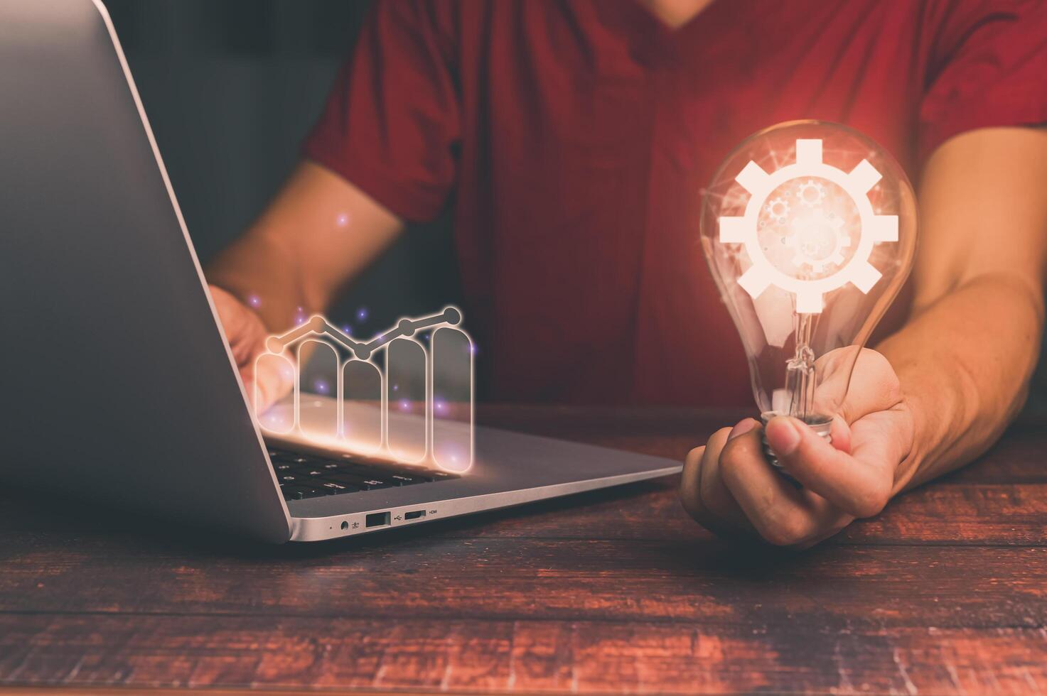 mão de um homem com uma lâmpada e há um ícone de engrenagem planejamento e estratégia, mercado de ações, crescimento do negócio, progresso ou sucesso ilustração concept.3d foto