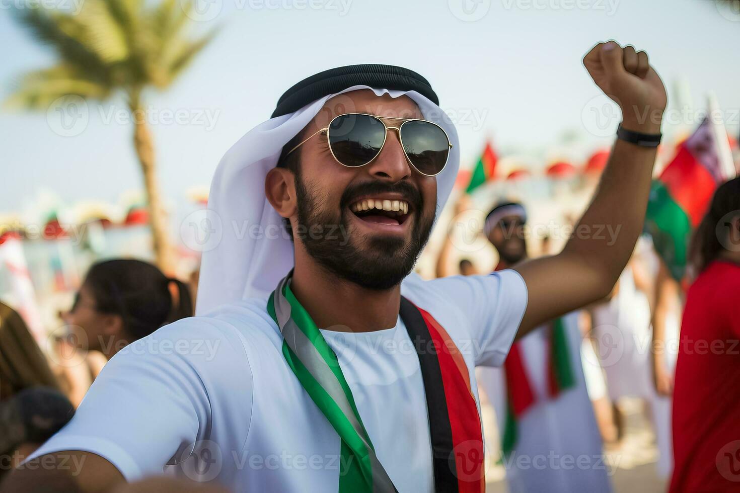 emirati de praia futebol fãs a comemorar uma vitória foto