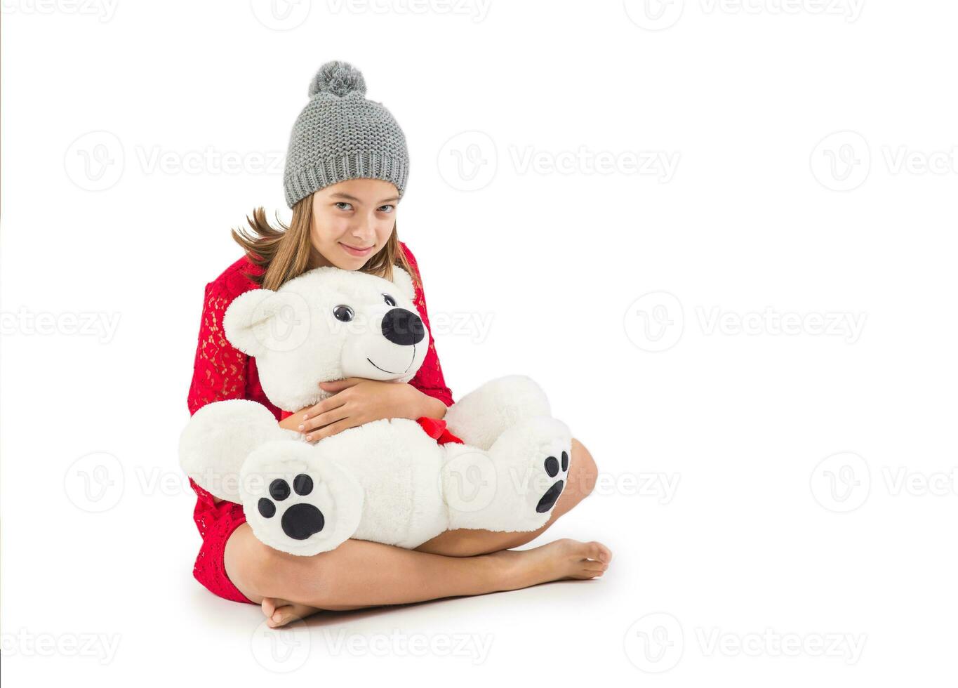 bonita jovem menina com Urso de pelúcia Urso isolado em branco foto