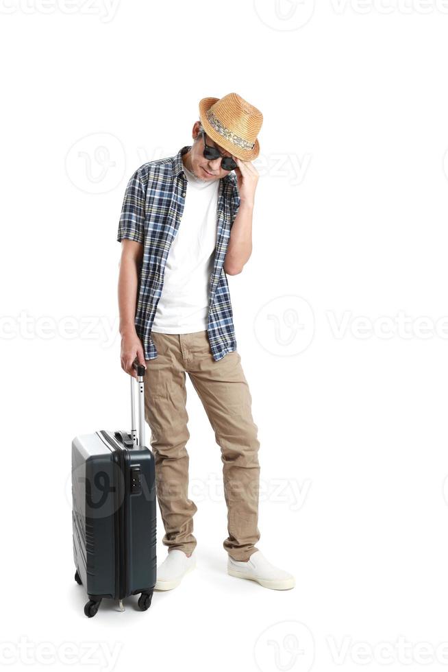 homem com bagagem foto