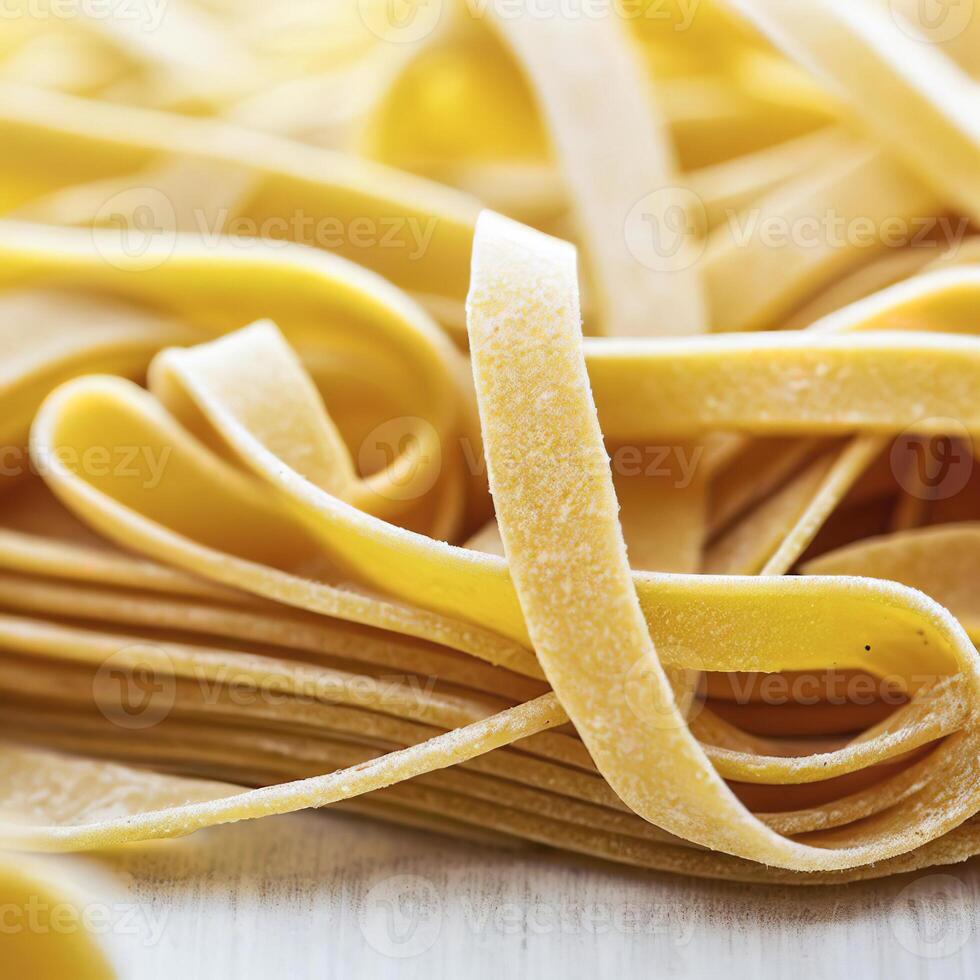 fechar acima do uma cru seco italiano massa fettuccine em branco de madeira mesa. ai generativo foto