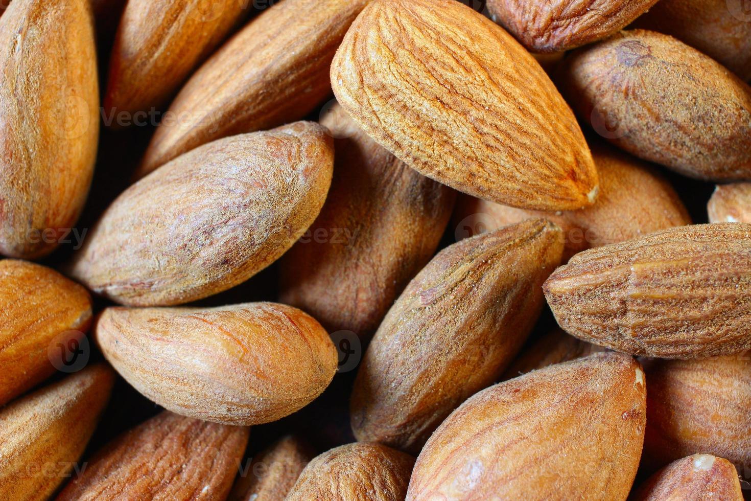 muitas amêndoas. close-up de porca deliciosa e saudável. foto