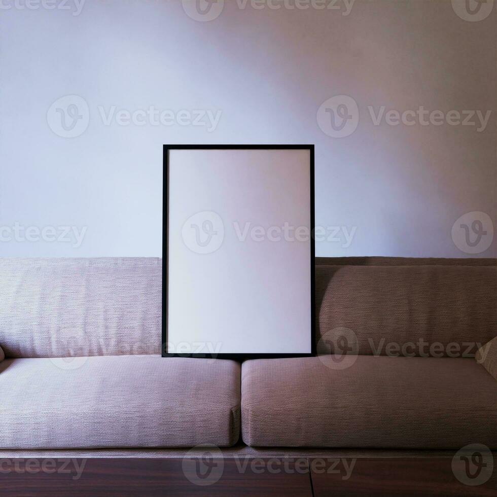minimalista quadro, Armação brincar poster em pé em a sofá dentro a vivo quarto com branco parede fundo foto