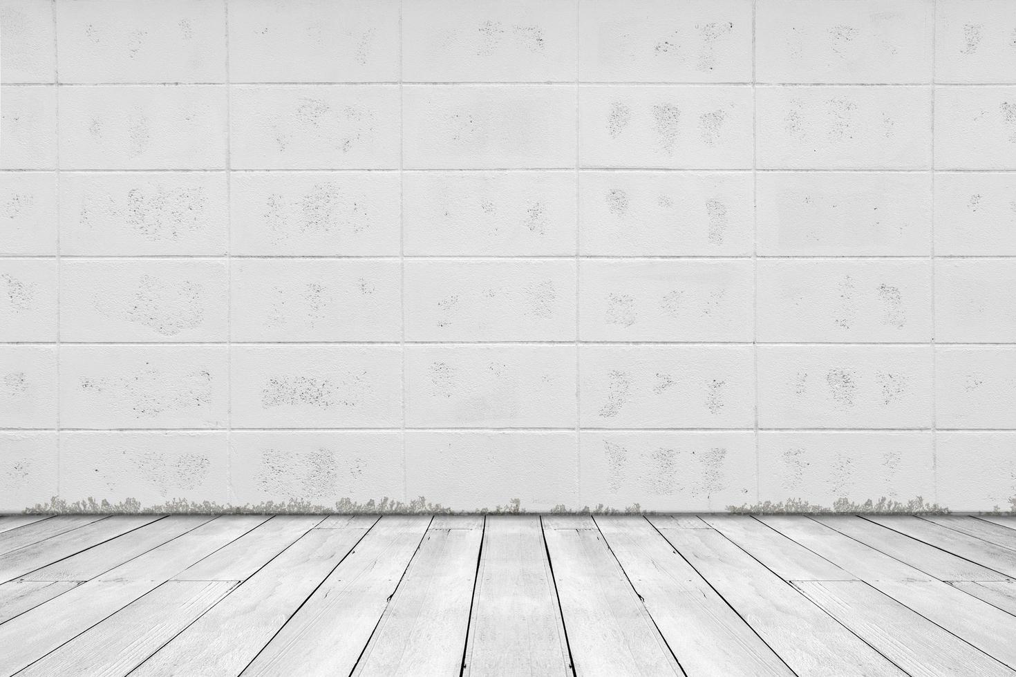 fundo abstrato da textura do grunge. sala vazia com parede de tijolos e piso de madeira foto