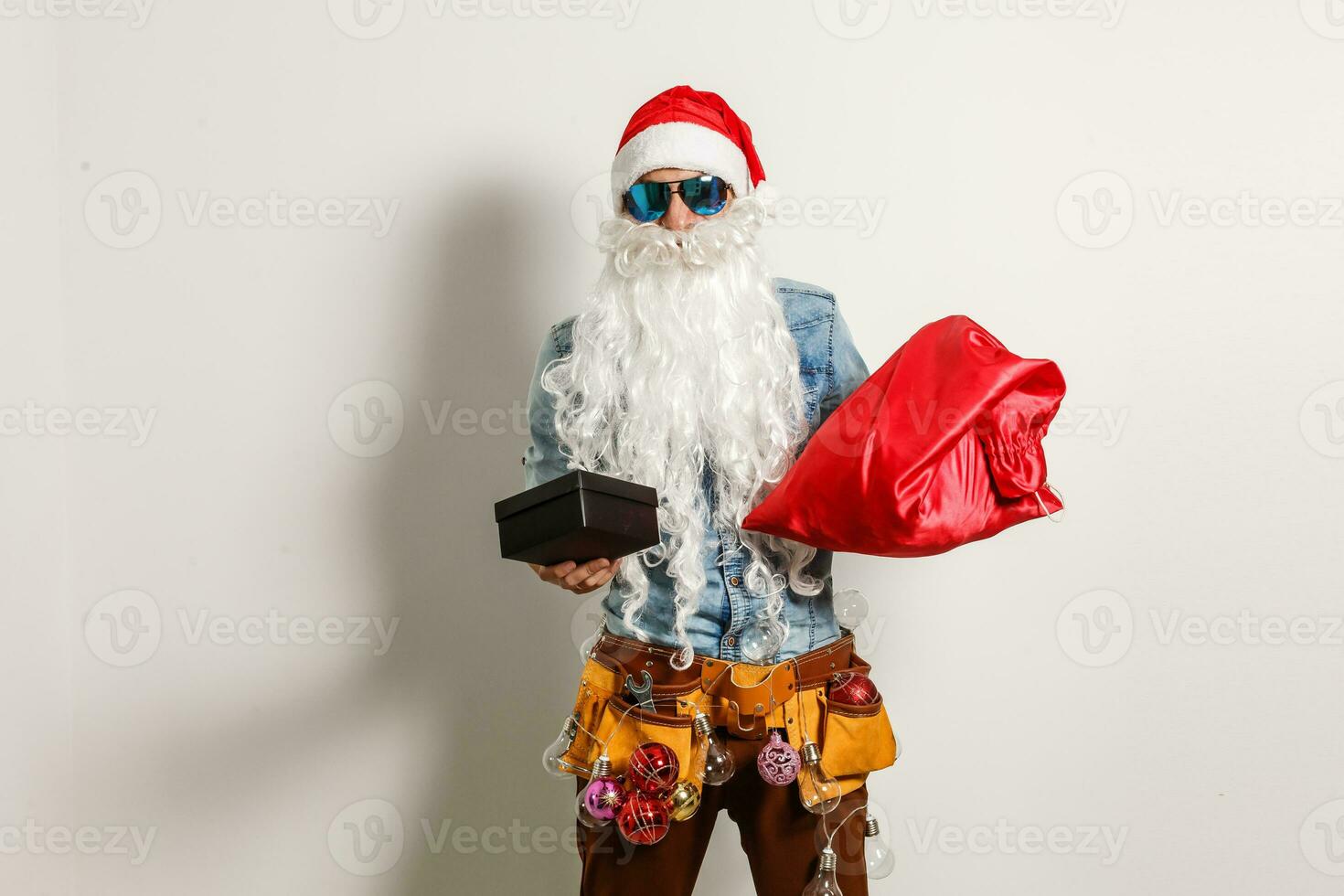 santa claus vestindo oculos escuros. legal santa foto