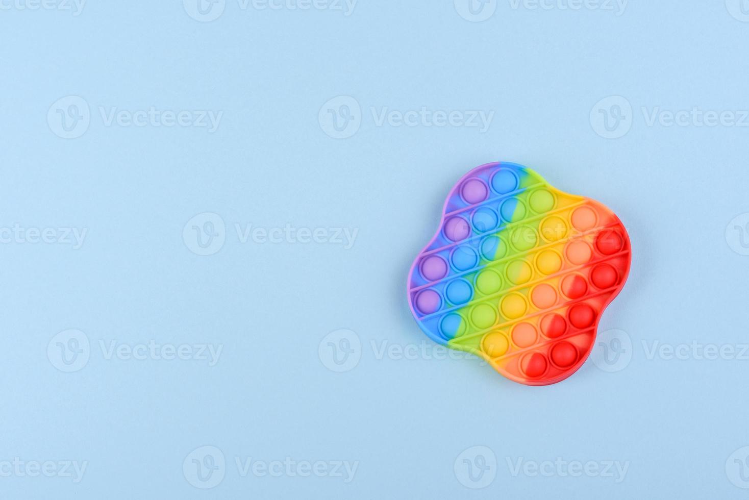 Brinquedo infantil colorido brilhante feito de silicone projetado para aliviar o estresse foto