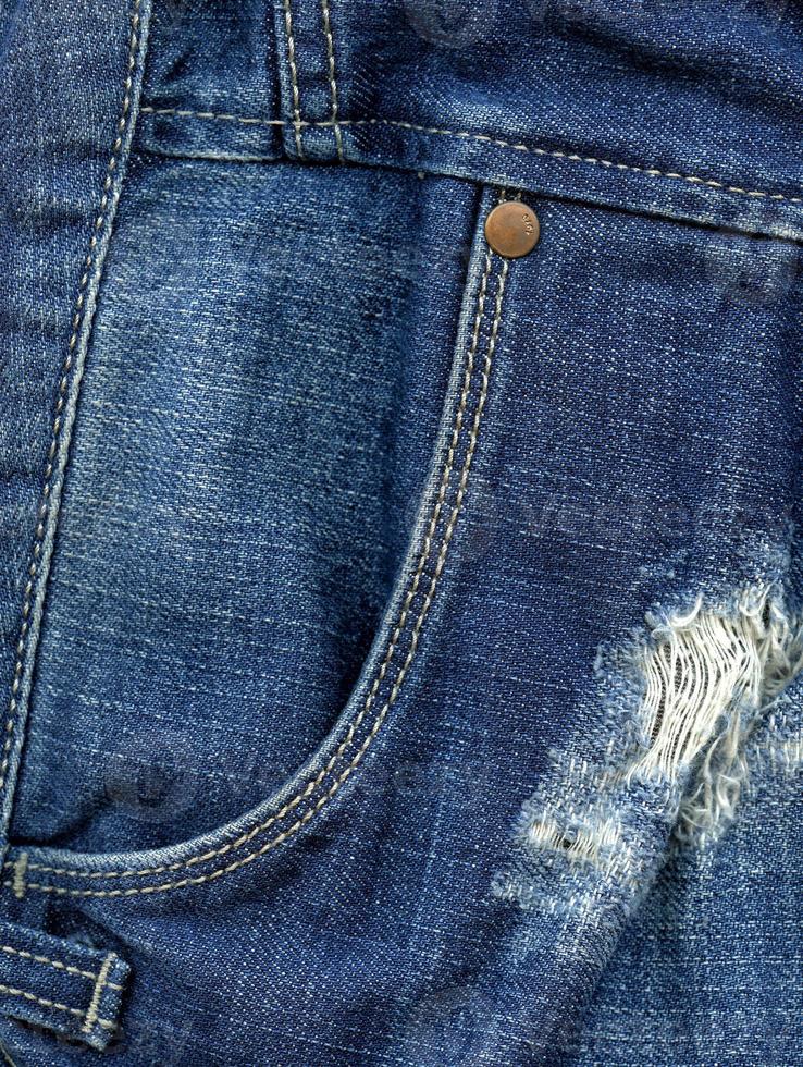têxtil, design de moda, fundo macro calça jeans foto