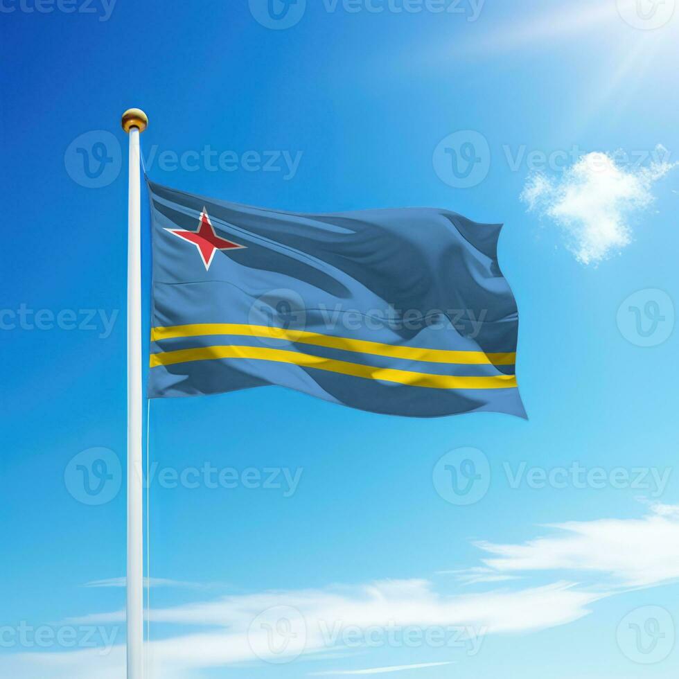 acenando bandeira do Aruba em mastro de bandeira foto