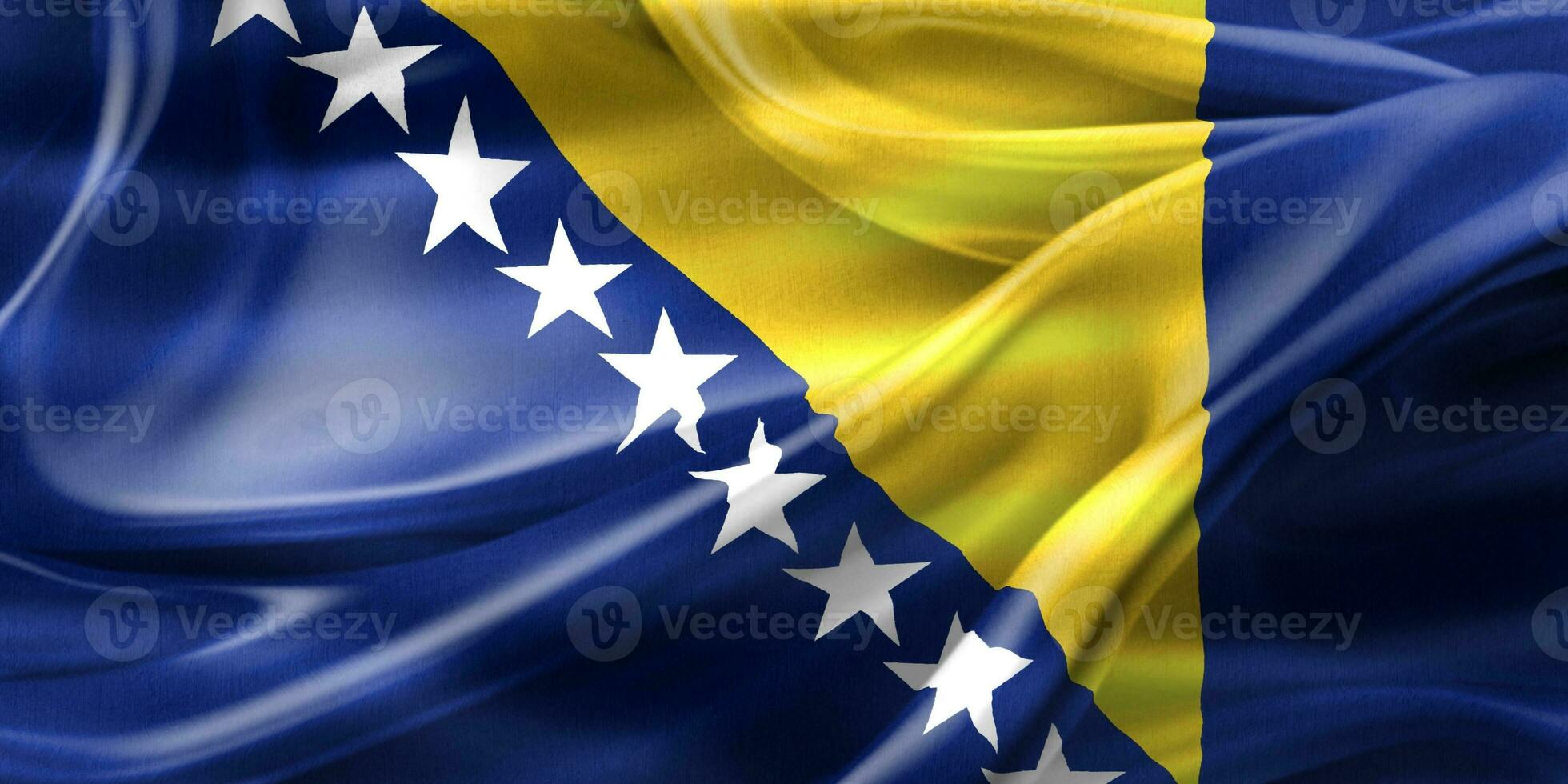 bandeira da bósnia e herzegovina - bandeira de tecido acenando realista foto
