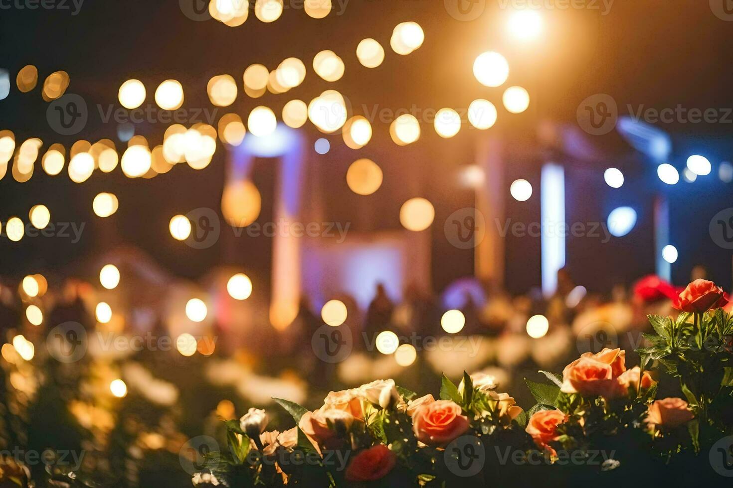uma flor arranjo dentro frente do uma etapa às noite. gerado por IA foto