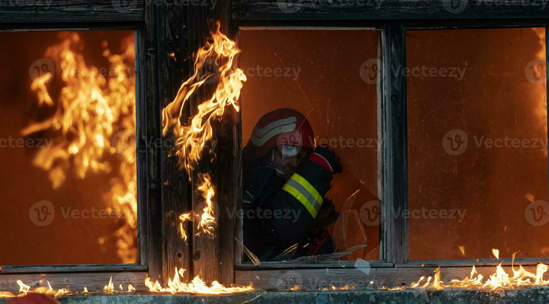 bombeiro herói carregando bebê menina Fora a partir de queimando construção área a partir de fogo incidente. resgate pessoas a partir de perigoso Lugar, colocar foto