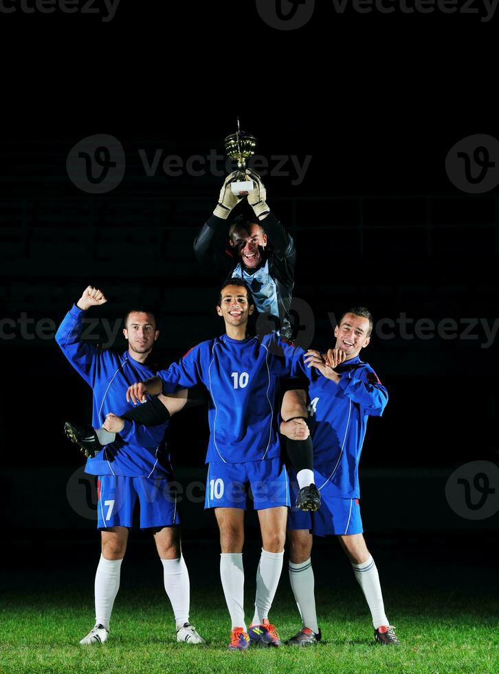 futebol jogadoras a comemorar a vitória foto