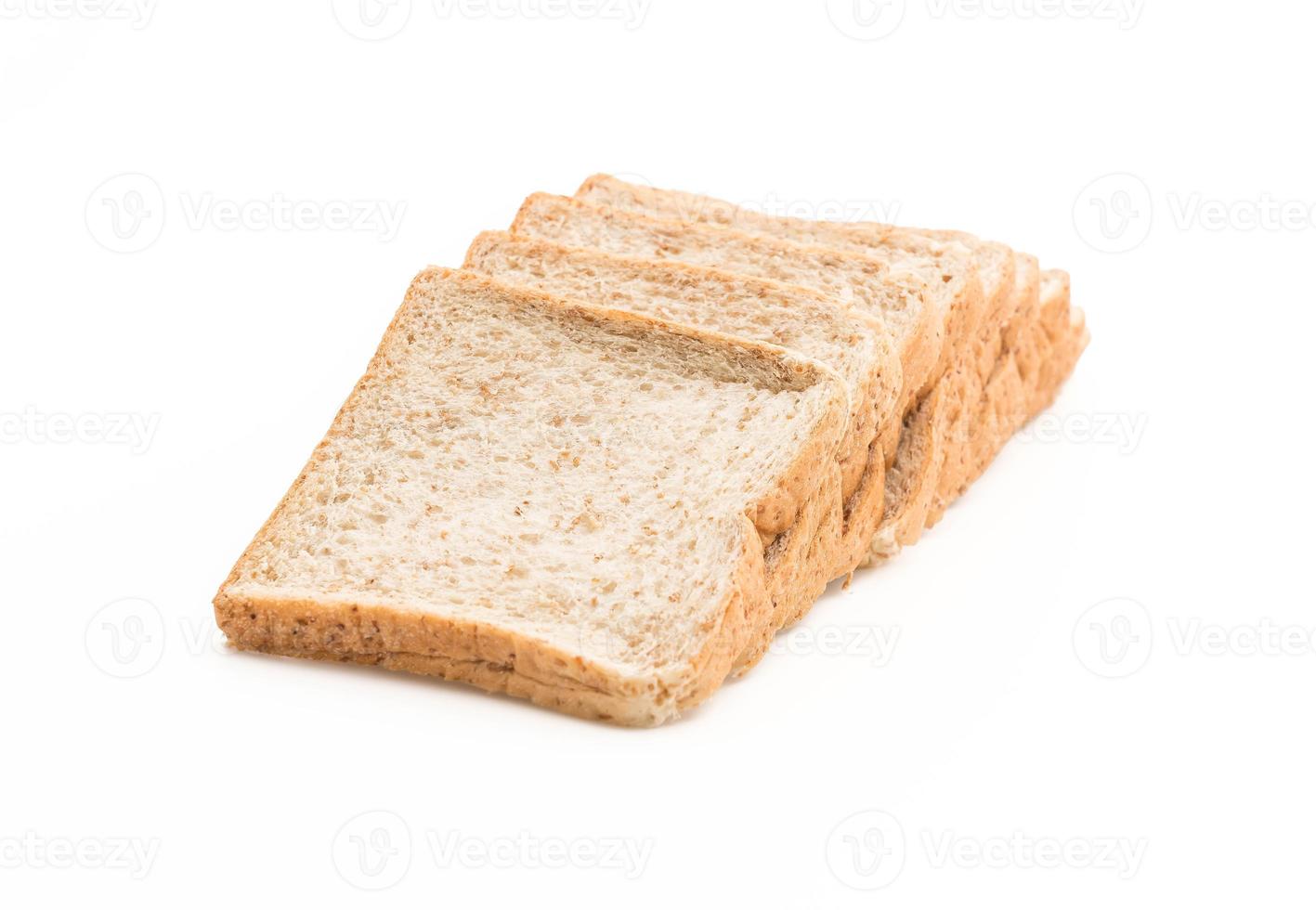 pão integral em fundo branco foto