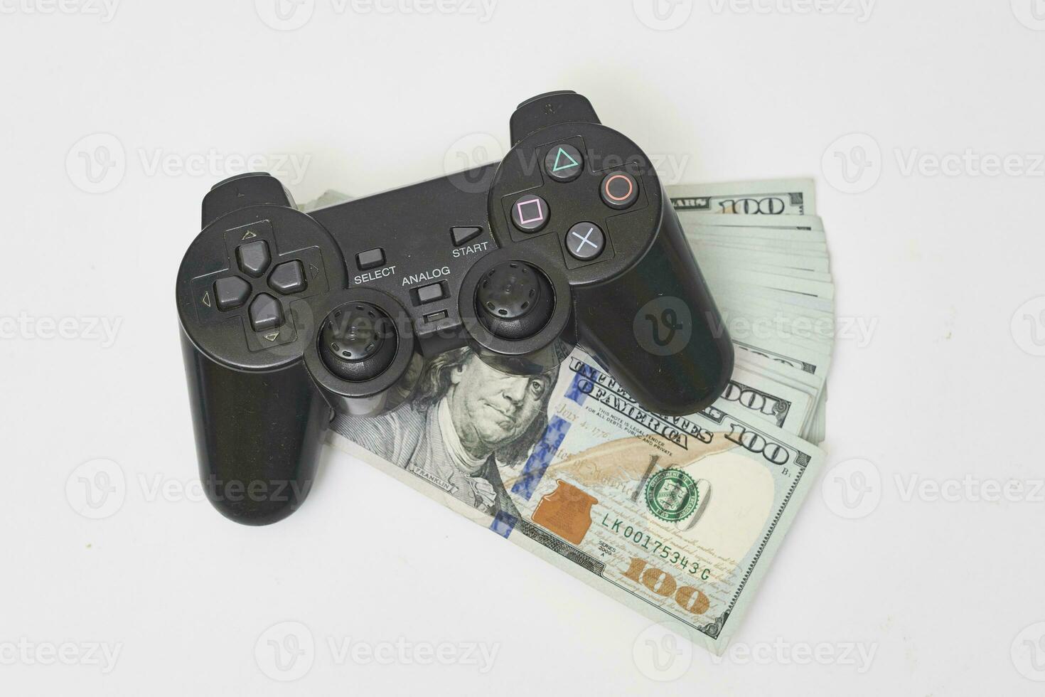 jogos console controlador e pilha do dinheiro foto