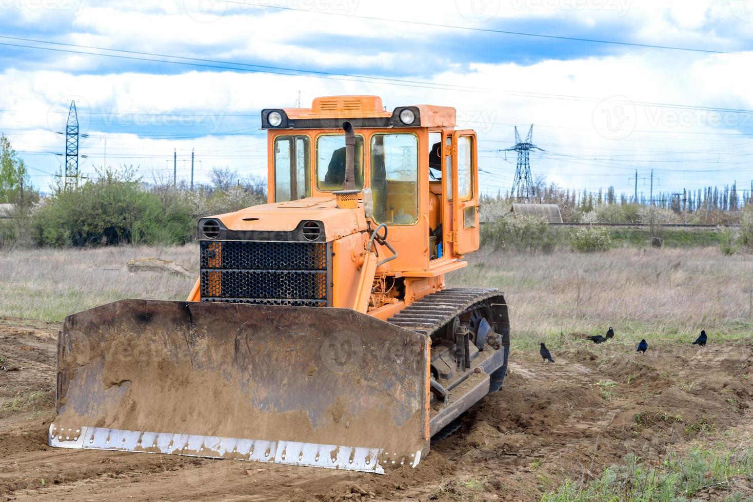 bulldozer para estaleiros de construção de edifícios industriais foto