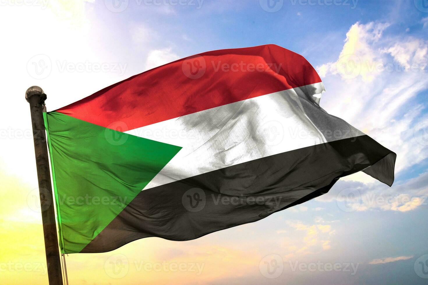 Sudão 3d Renderização bandeira acenando isolado céu e nuvem fundo foto