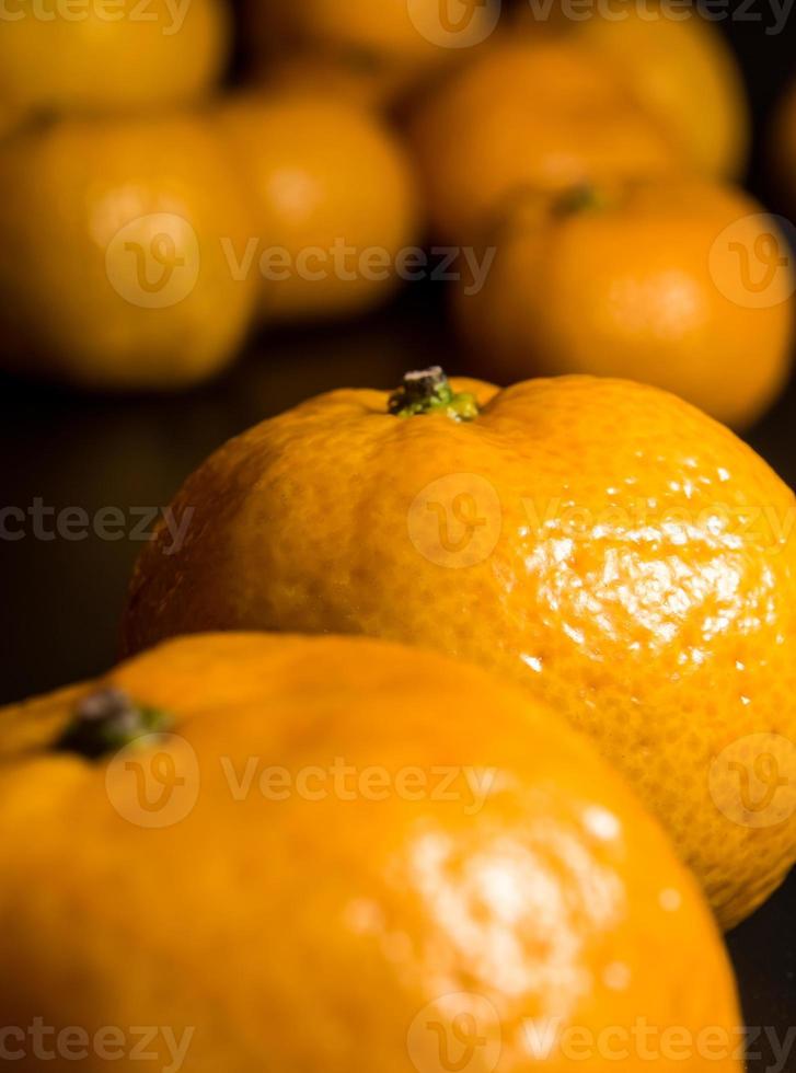 textura de superfície brilhante de frutas frescas de laranja foto