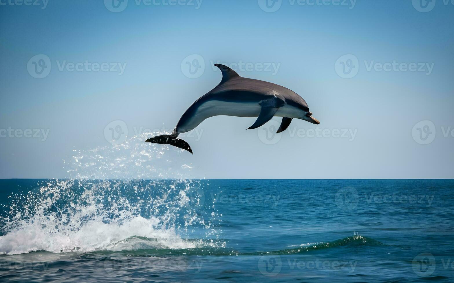 capturando a elegância, uma fechar encontro com uma golfinho gracioso salto a partir de a oceano profundidades. ai gerado foto