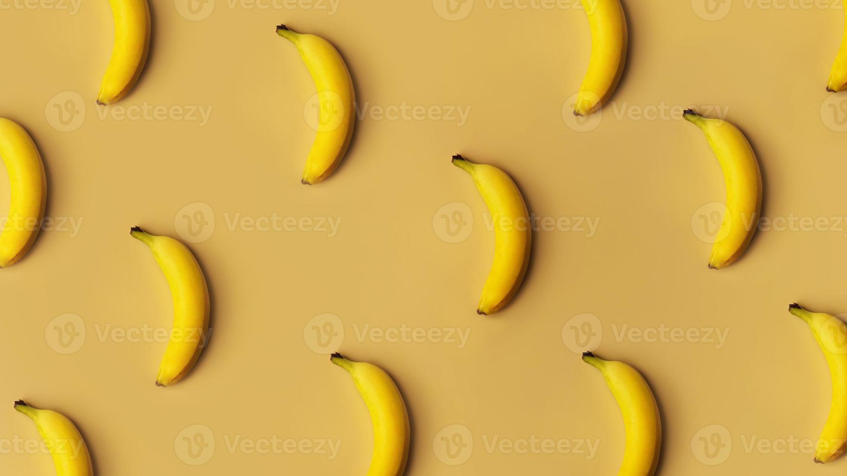 fundo de bananas em uma fileira em um fundo dourado foto